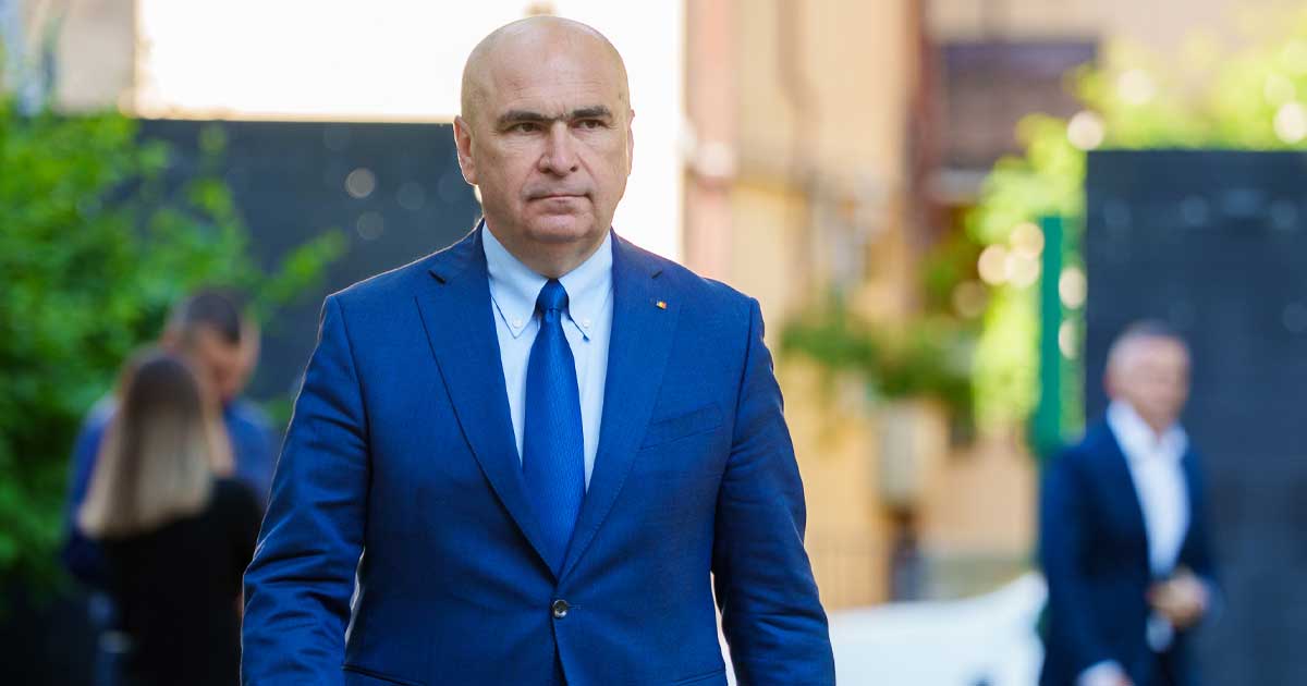 Premierul Ilie Bolojan sosind la Camera Deputaților pentru negocieri cu Sorin Grindeanu pe bugetul de stat, 19 martie 2026