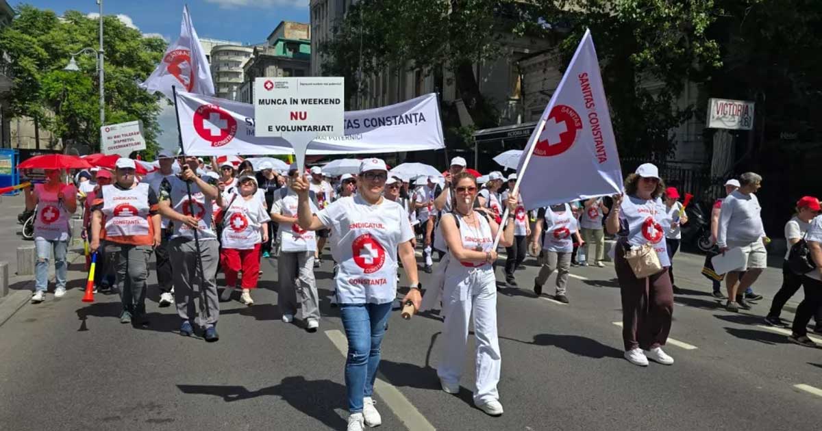 Reprezentanți ai confederațiilor sindicale la o conferință de presă privind legea salarizării, București, iulie 2026